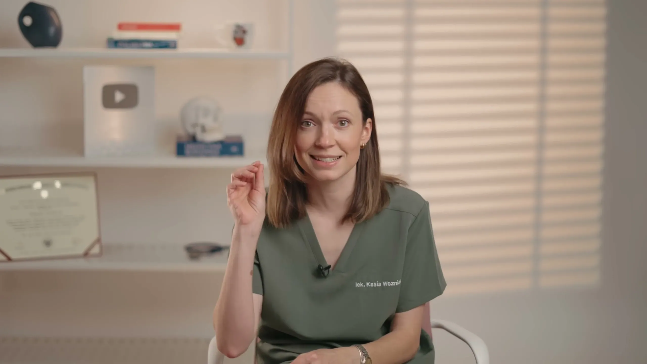 Kasia Wozniak, MD, explaining something in her office