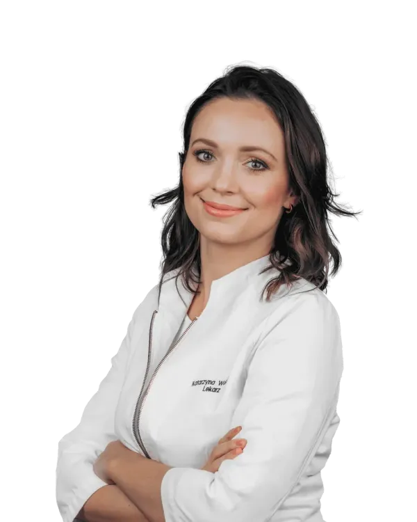 Kasia Wozniak, MD, in a white coat